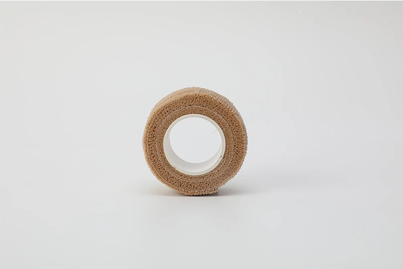 Rollo de vendaje de poli&eacute;ster corto resistente